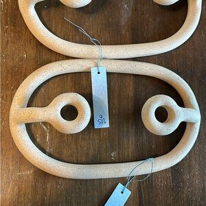 Tan Curved Candle Holders with Modern Design by Sin